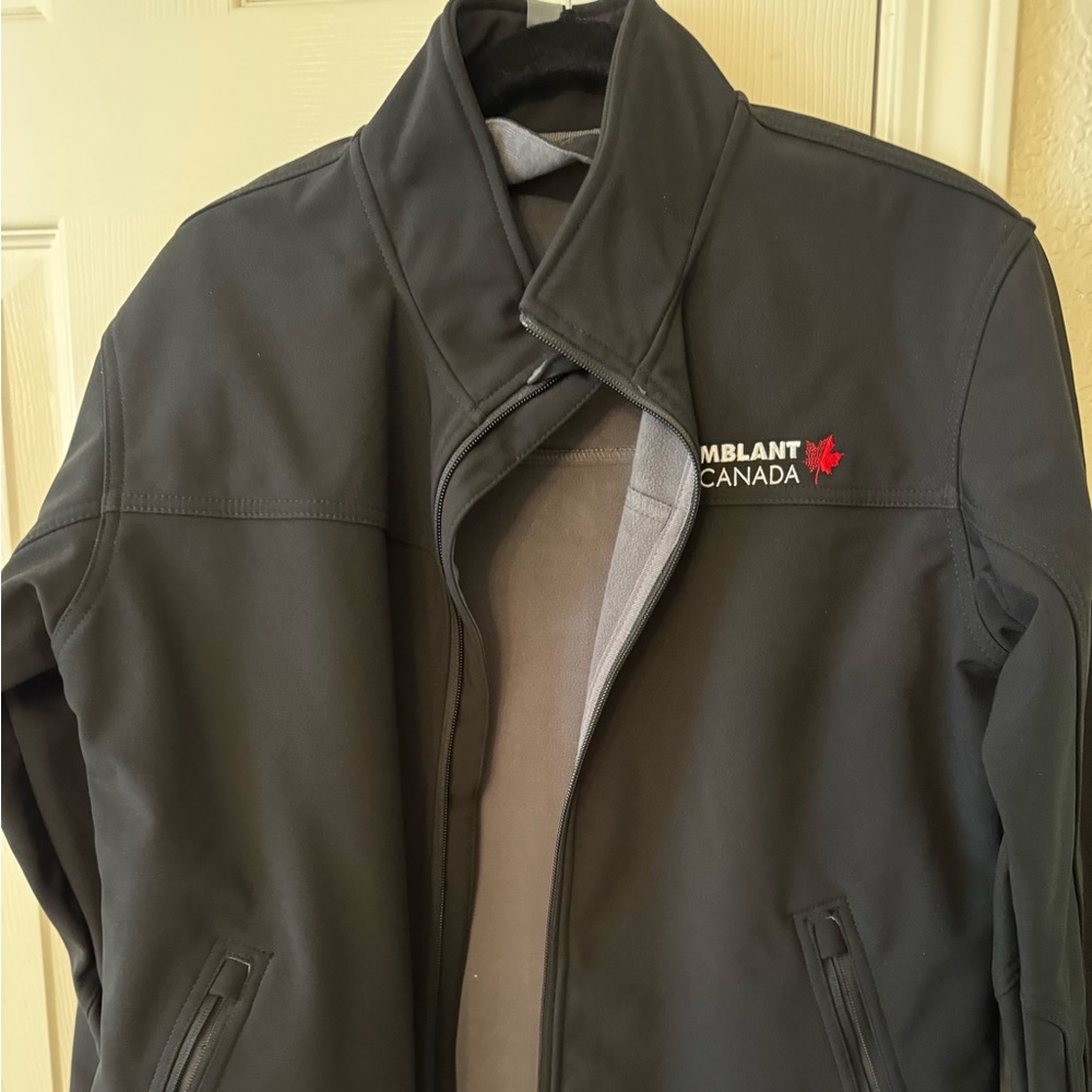 NEW Rain jacket. Unisex.